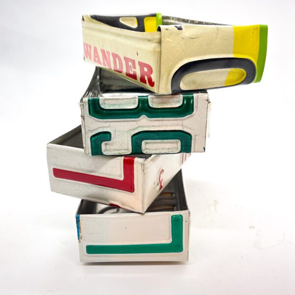 A stack of Vintage License Plate Valet Trays stacked on top of each other.