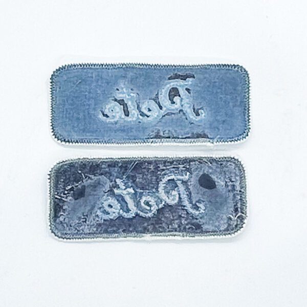 A pair of Vintage "Pete" iron on patches with the word pata on them.