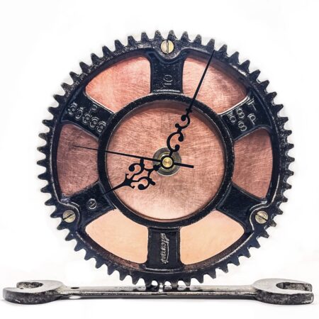 A Copper Clock from salvaged materials with gears on it.